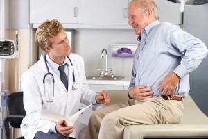 bigstock-Doctor-Examining-Male-Patient--41853457